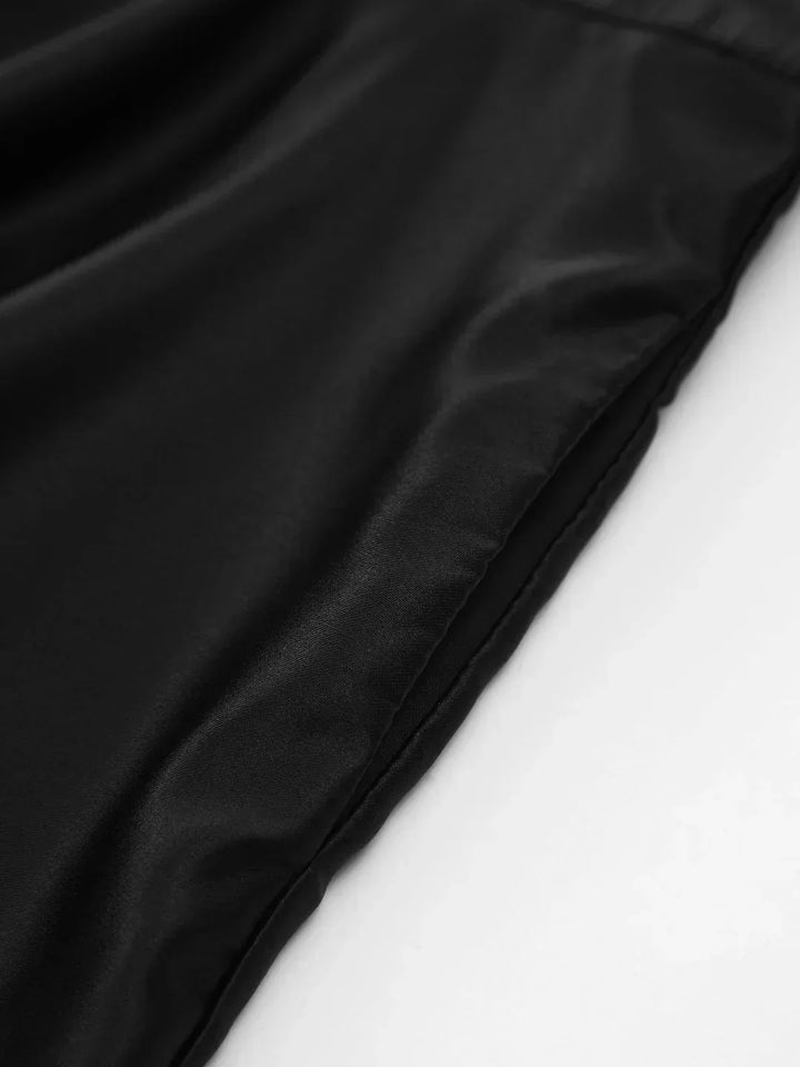 Carolina | Vestido mini plisado de satén con nudo, bolsillos dobles y espalda abierta